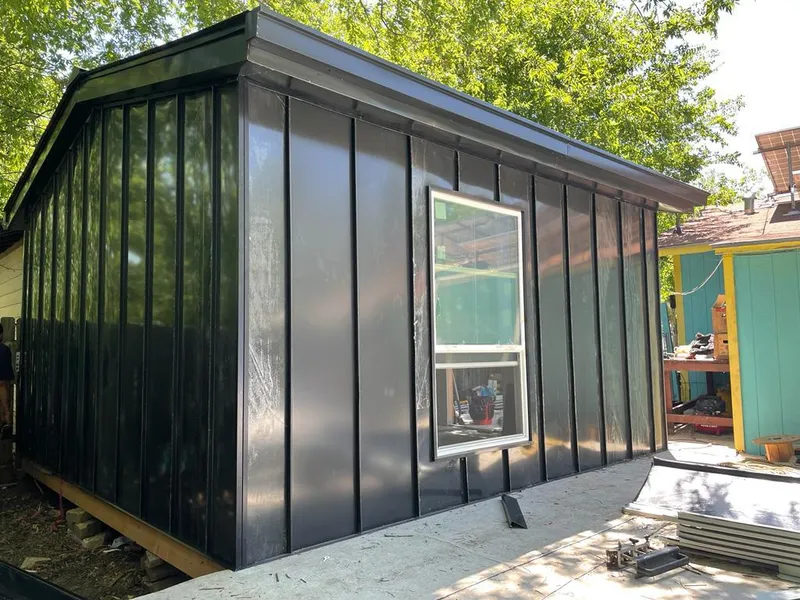 Black standing seam metal wall panels for Roof Inspection in Enumclaw